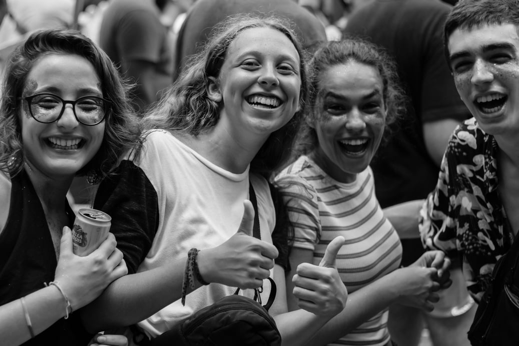 Grayscale Photo of People Having Fun